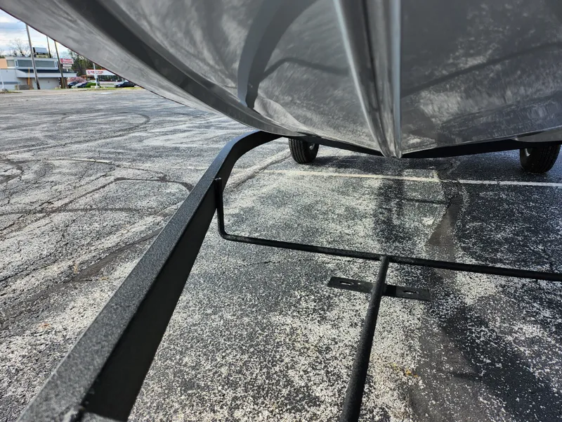 Slide: The Image of 2022 Tracker Pro 170 boat on trailer, parked on asphalt surface. - 8