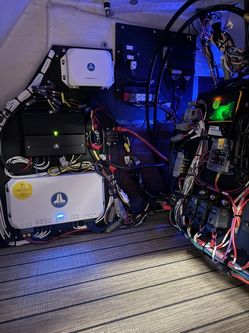 Slide: The Image of Electrical system setup in a 2025 Sylvan G-3 CLZ DH boat, featuring advanced wiring and components. - 11
