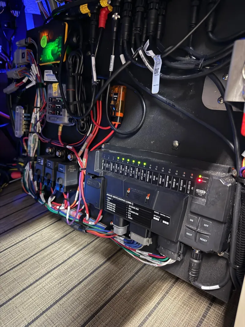 Slide: The Image of Electrical panel with wiring in a 2025 Sylvan G-3 CLZ DH boat. - 12