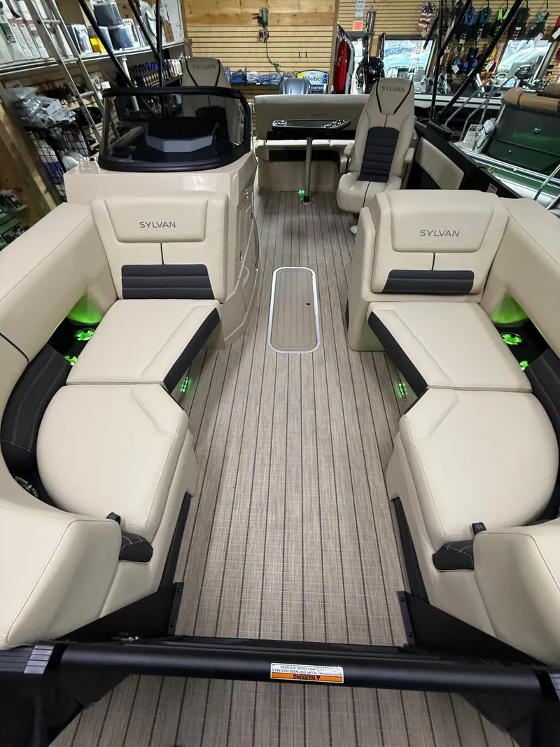 Slide: The Image of 2025 Sylvan G-3 CLZ DH boat interior with beige seating and modern design. - 23