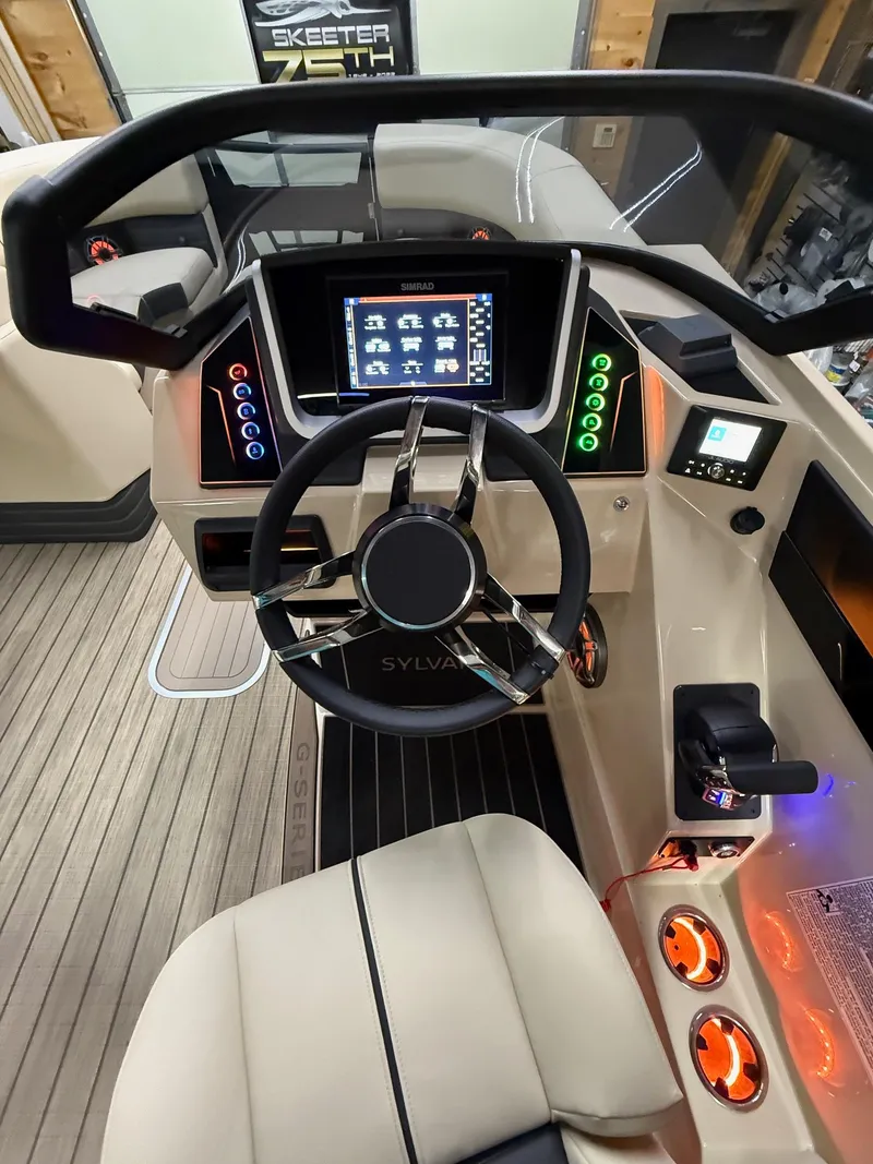 Slide: The Image of Modern Sylvan G-3 CLZ DH 2025 boat dashboard with advanced controls and digital display. - 29