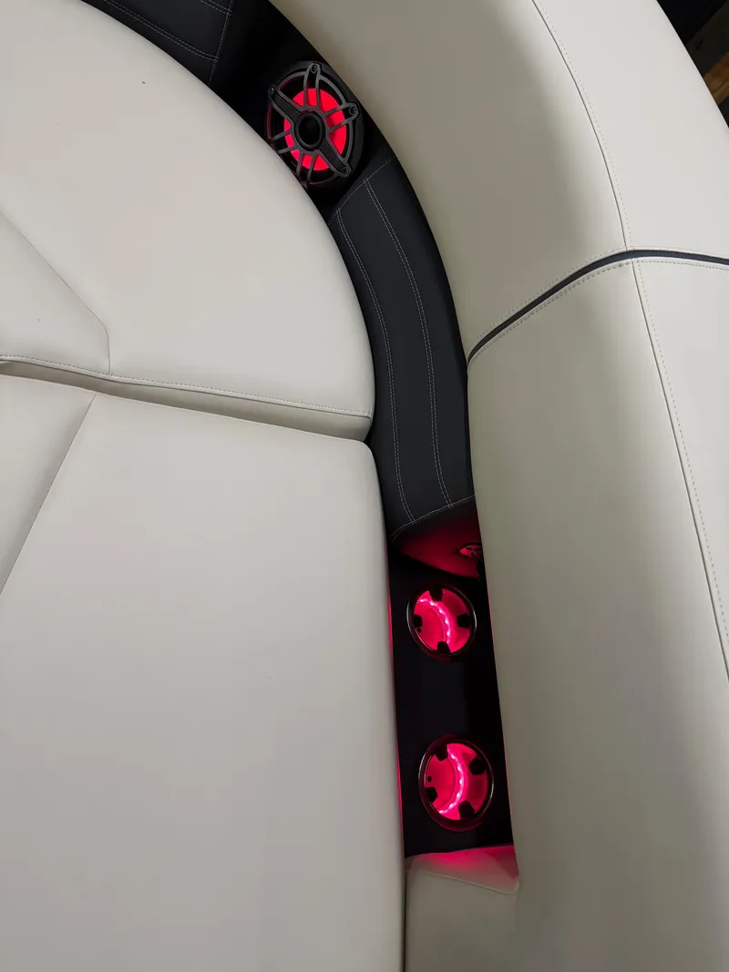 Slide: The Image of Luxurious Sylvan G-3 CLZ DH 2025 boat seating with red LED cup holders. - 5