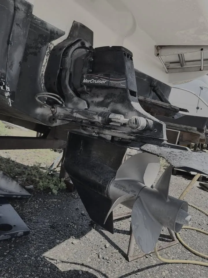 Slide: The Image of 2006 Sea Ray Sundancer with MerCruiser outdrive and propeller, displayed on a trailer. - 5