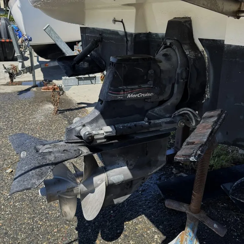 Slide: The Image of 2006 Sea Ray Sundancer MerCruiser outdrive on a boat trailer. - 6