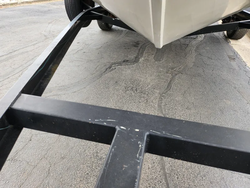 Slide: The Image of Crestliner 1850 Sportfish 2000 boat on trailer, viewed from below. - 7