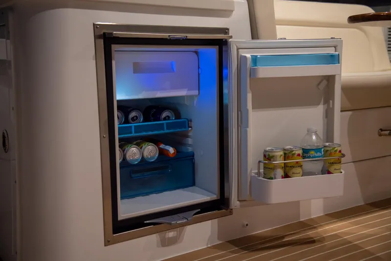 Slide: The Image of Open mini fridge on MJM 35 yacht, stocked with beverages, 2025 model. - 32