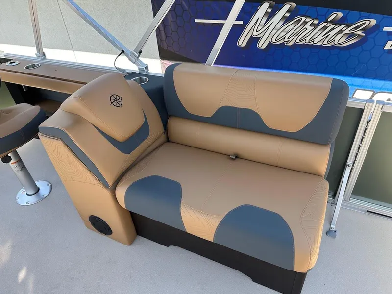 Slide: The Image of 2025 Tahoe Pontoon Geofish RF boat seat with tan and gray upholstery. - 32