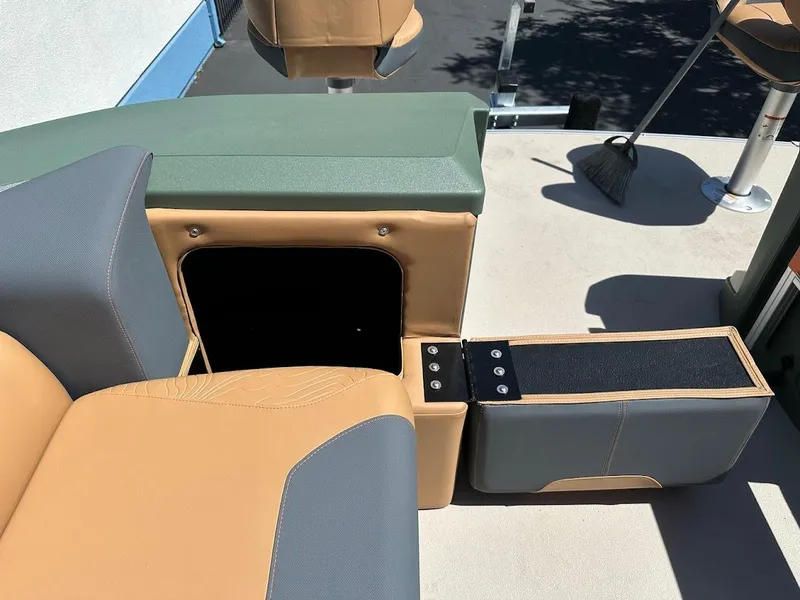 Slide: The Image of 2025 Tahoe Pontoon Geofish RF interior seating and storage compartments. - 38