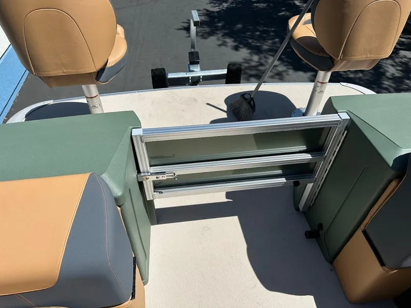 Slide: The Image of 2025 Tahoe Pontoon Geofish RF interior with seating and storage compartments. - 40