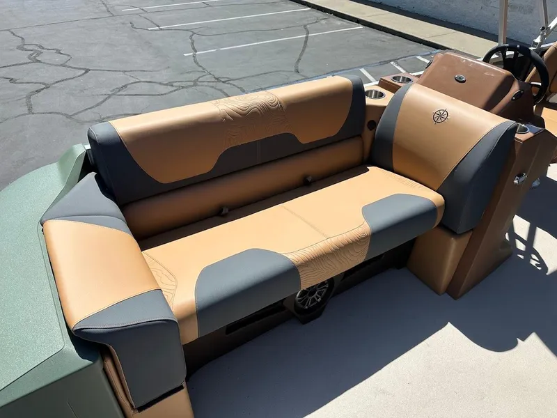 Slide: The Image of 2025 Tahoe Pontoon Geofish RF boat seating with tan and gray upholstery. - 41