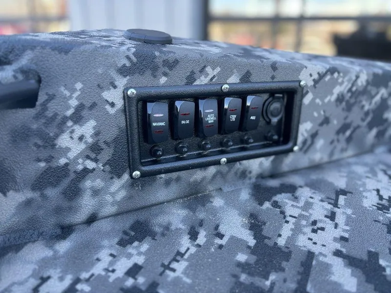 Slide: The Image of Control panel on 2025 Havoc 1656 VJST boat with camouflage design. - 17