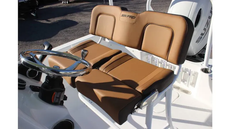 Slide: The Image of 2025 Sea Pro 202 CC boat with tan leather seating and steering wheel. - 10