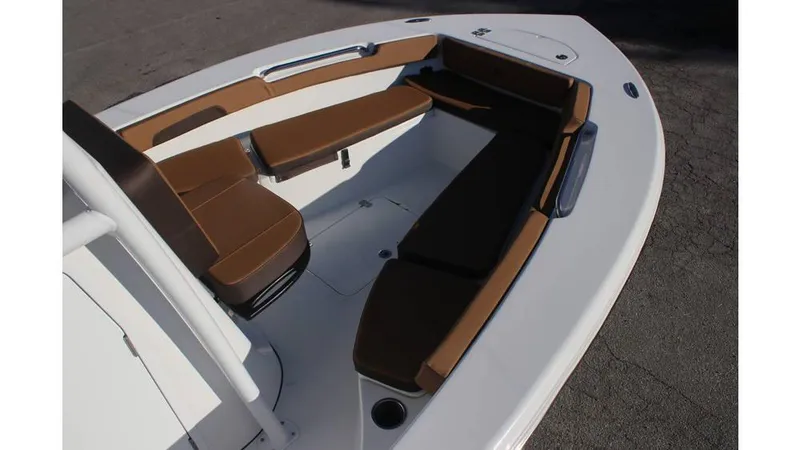 Slide: The Image of 2025 Sea Pro 202 CC boat with brown cushioned seating in the bow area. - 6