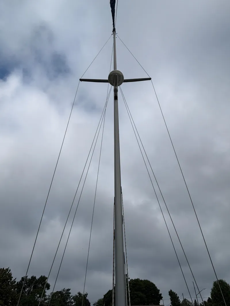Slide: The Image of Mast of 2002 Catalina 36MKII sailboat against cloudy sky. - 22
