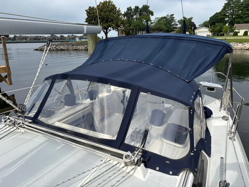 Slide: The Image of Catalina 36MKII sailboat, 2002 model, docked with blue canvas cover. - 25