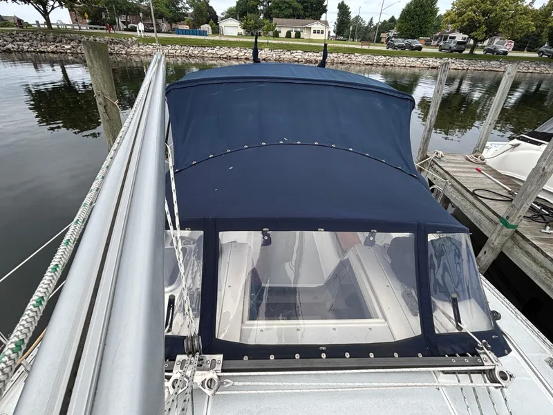 Slide: The Image of Catalina 36MKII sailboat, 2002 model, docked with blue canvas cover and clear windows. - 27