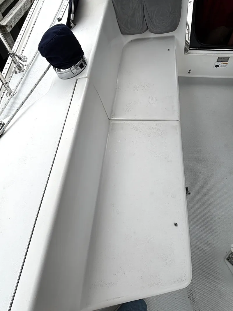 Slide: The Image of White seating area on a 2002 Catalina 36MKII sailboat deck. - 37