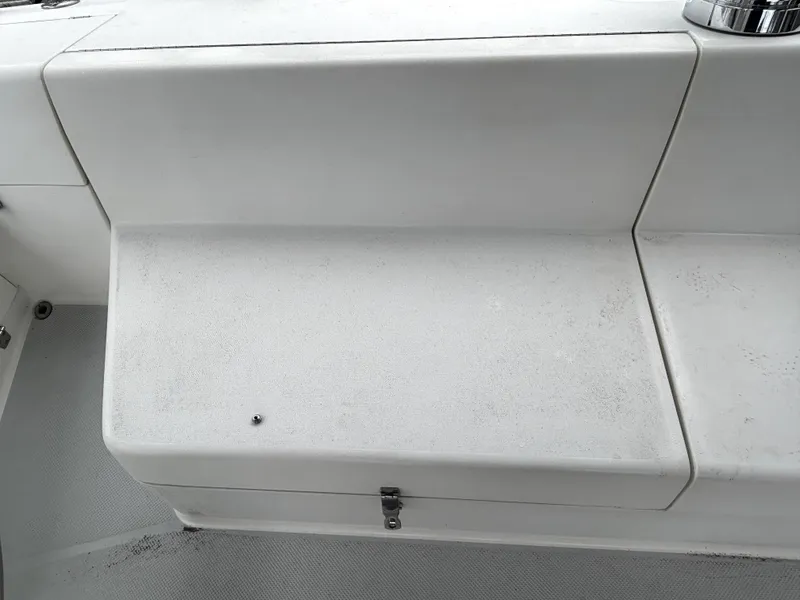 Slide: The Image of White deck area of a 2002 Catalina 36MKII sailboat, featuring a storage compartment. - 40