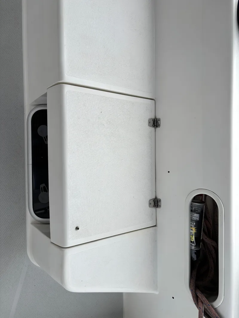 Slide: The Image of White storage compartment on a 2002 Catalina 36MKII sailboat deck. - 42