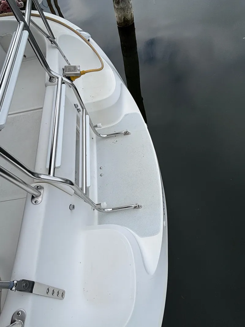 Slide: The Image of Catalina 36MKII 2002 boat stern with stainless steel ladder and docked at marina. - 48