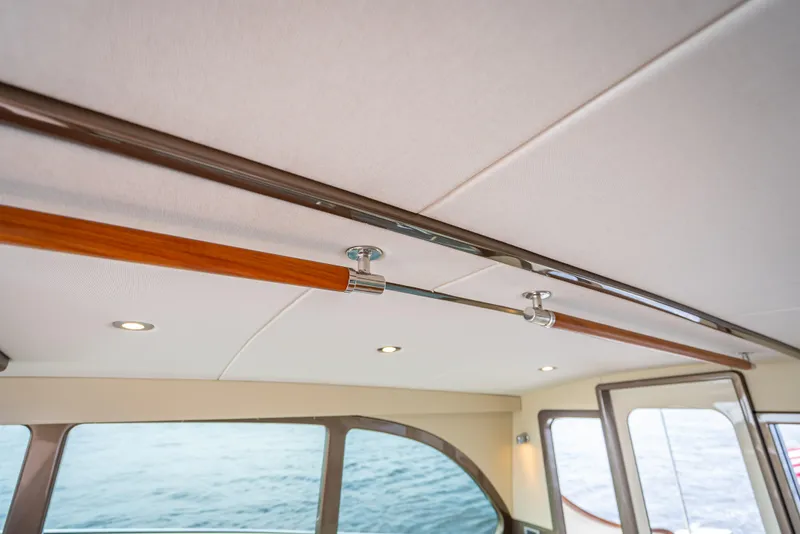 Slide: The Image of Interior view of 2018 Palm Beach Motor Yachts PB45, featuring elegant ceiling design. - 23