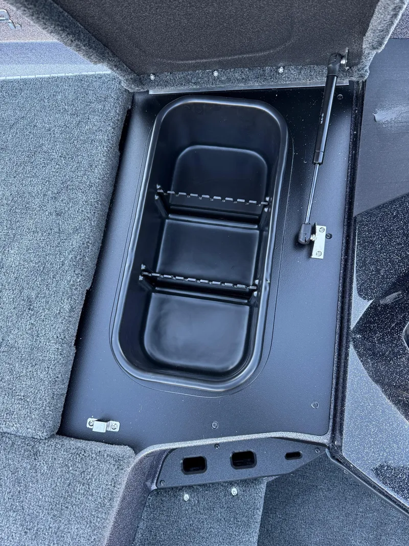 Slide: The Image of Storage compartment in 2025 Skeeter ZXR 20 SE boat, featuring durable interior design. - 22