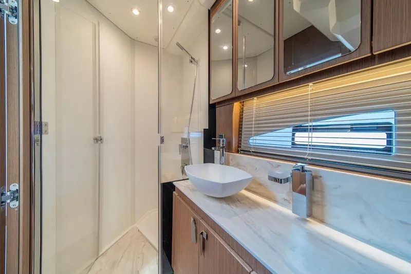 Slide: The Image of Luxurious bathroom interior in 2025 Prestige F4.9 yacht with modern fixtures and elegant design. - 31