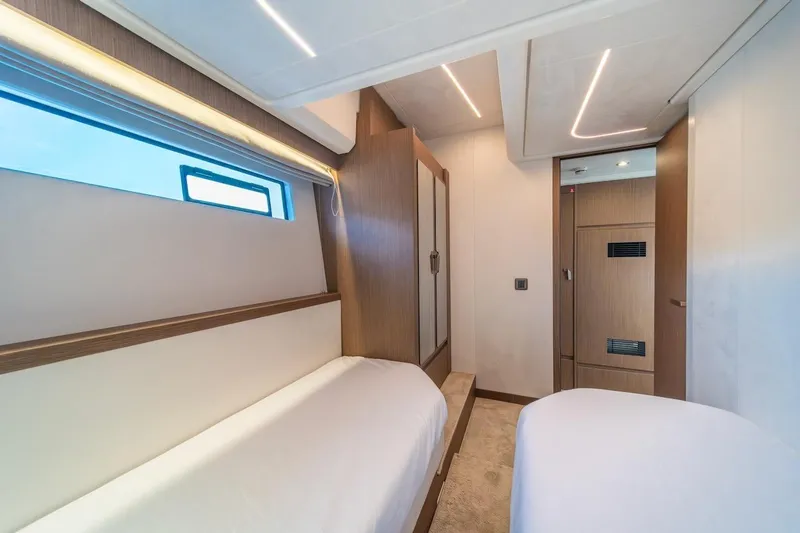 Slide: The Image of Luxurious cabin interior of 2025 Prestige F4.9 yacht with modern design and ambient lighting. - 35