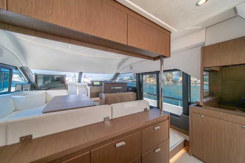 Slide: The Image of Luxurious interior of 2025 Prestige F4.9 yacht with modern furnishings and scenic views. - 46
