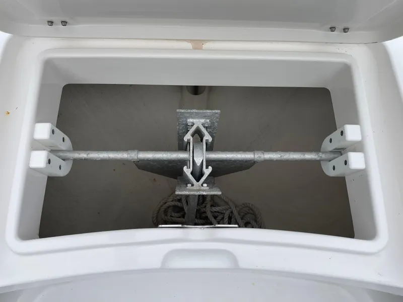Slide: The Image of Anchor storage compartment on a 2016 Regulator 28 boat. - 18