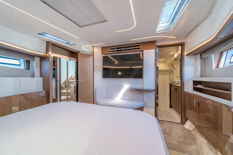 Slide: The Image of Luxurious interior of 2025 Prestige F4.9 yacht with modern design and elegant furnishings. - 27
