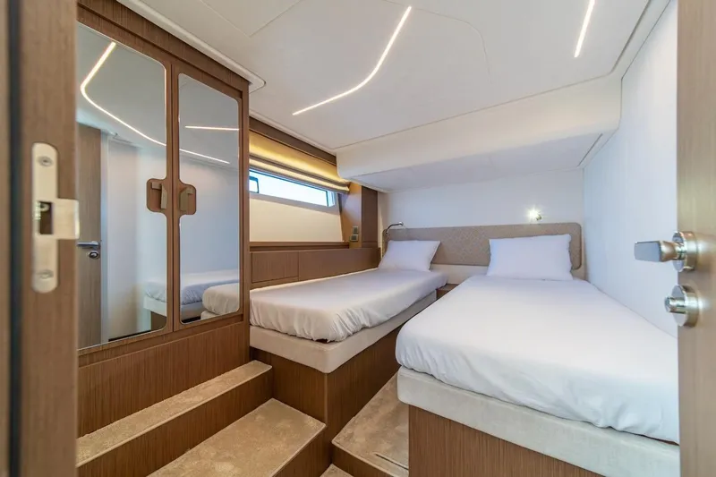 Slide: The Image of Luxurious twin cabin interior of 2025 Prestige F4.9 yacht with modern design. - 32