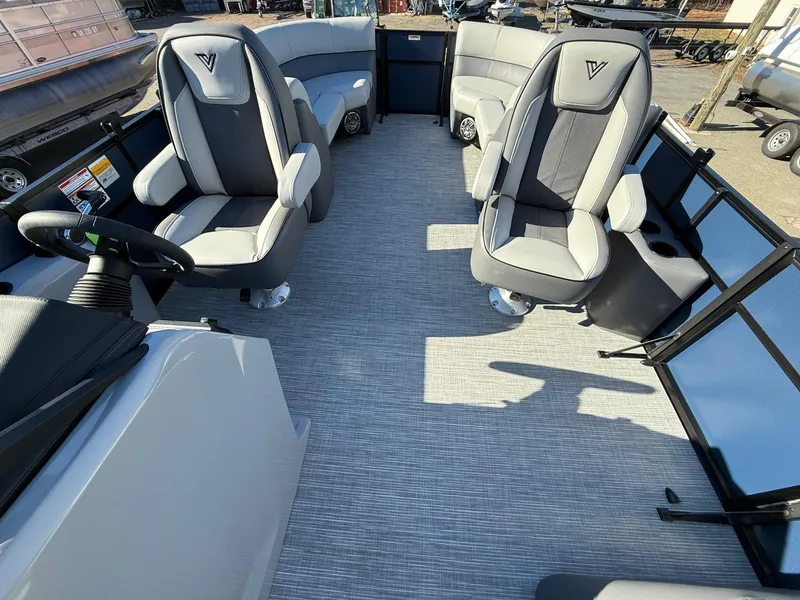 Slide: The Image of Interior of 2025 Viaggio V22U boat with modern seating and steering console. - 15
