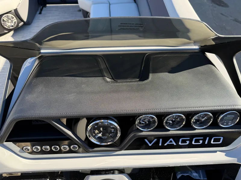 Slide: The Image of 2025 Viaggio V22U dashboard with sleek design and modern gauges. - 26