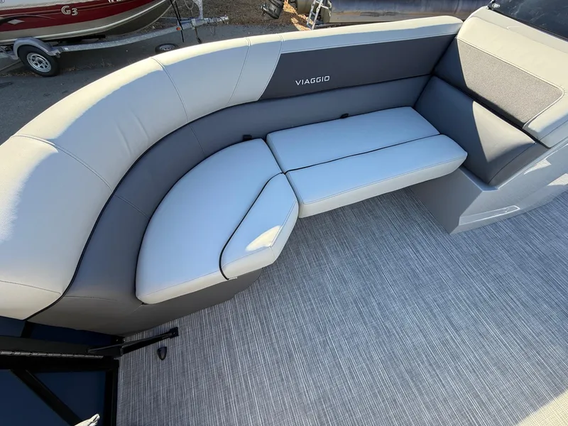 Slide: The Image of Luxurious seating on 2025 Viaggio V22U boat, featuring sleek gray upholstery. - 27