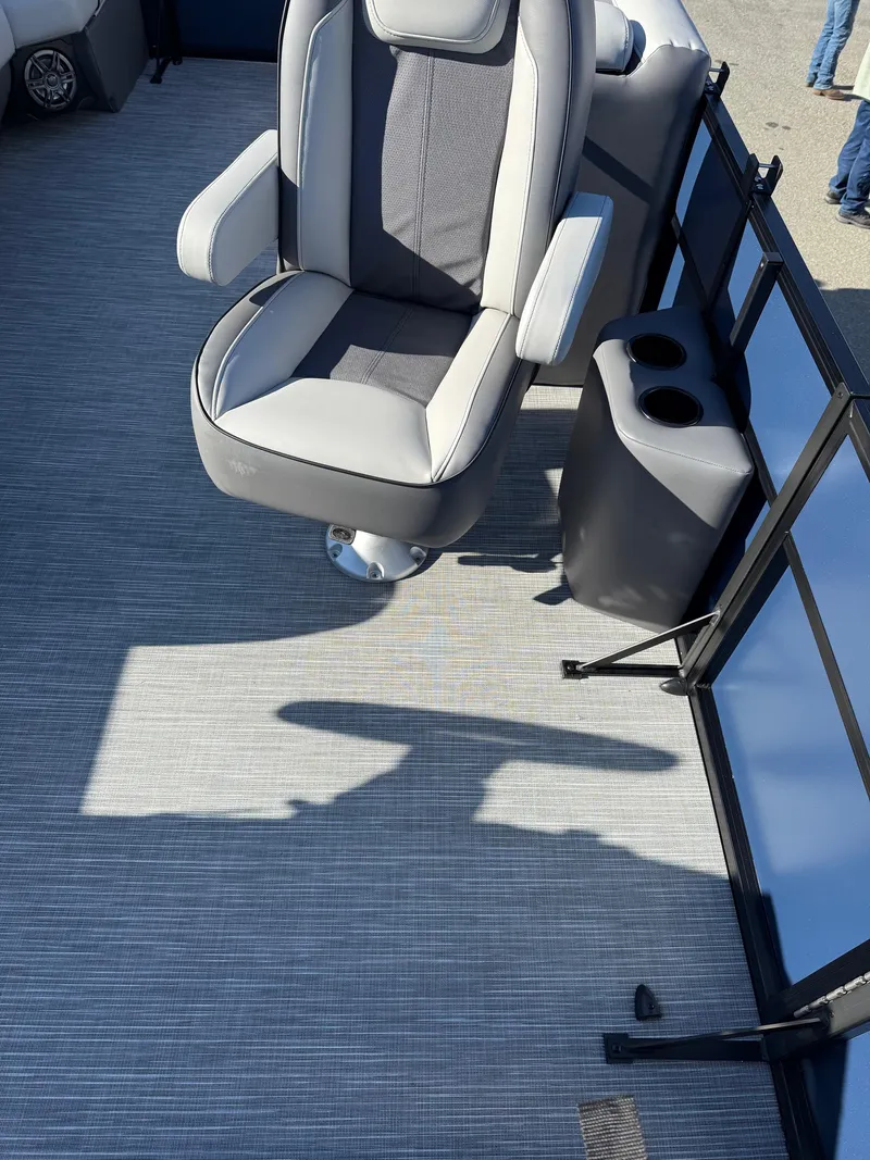 Slide: The Image of Captain's chair on 2025 Viaggio V22U boat with modern design and cup holders. - 28