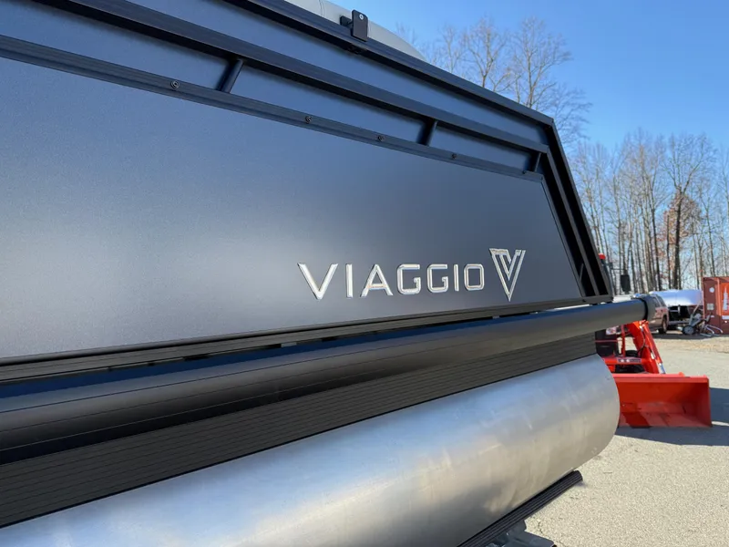 Slide: The Image of 2025 Viaggio V22U boat detail with logo, sleek design, and outdoor setting. - 32