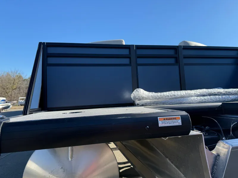 Slide: The Image of 2025 Viaggio V22U pontoon boat with sleek black panels and aluminum structure. - 33