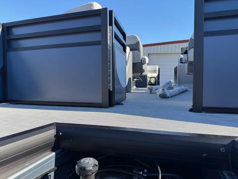 Slide: The Image of 2025 Viaggio V22U pontoon boat interior with seating and storage compartments. - 4