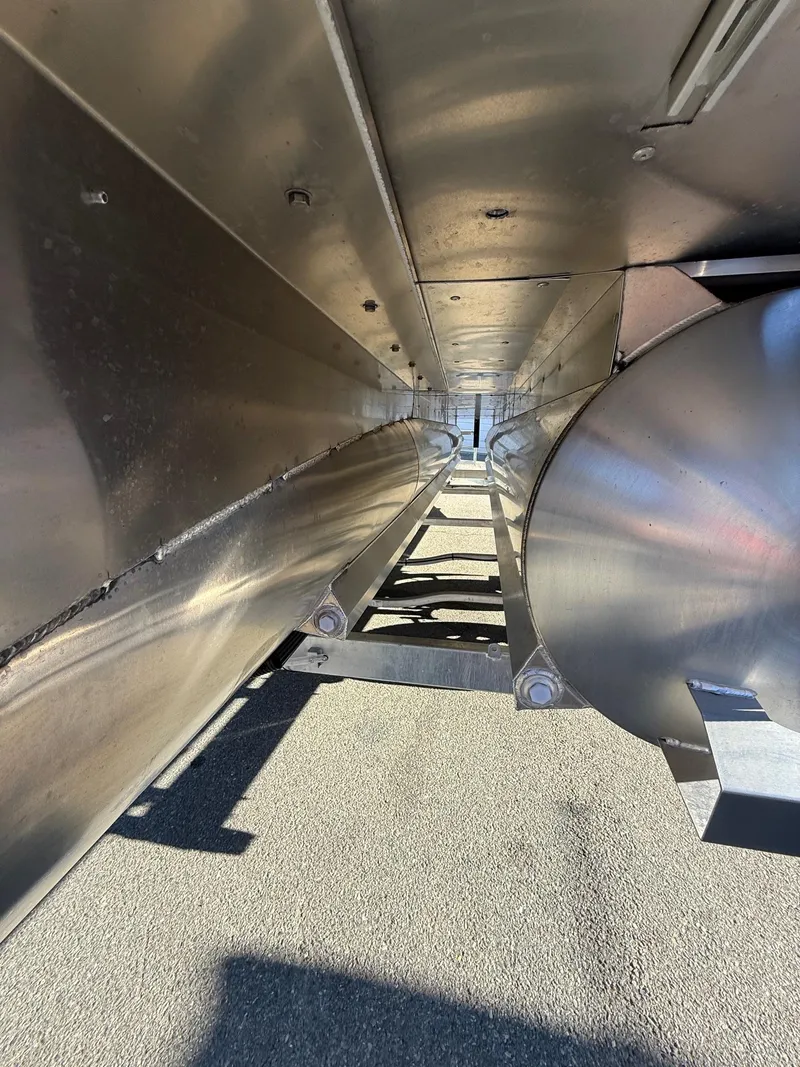 Slide: The Image of Underneath view of a 2025 Viaggio V22U vehicle, showcasing its metallic structure and components. - 7
