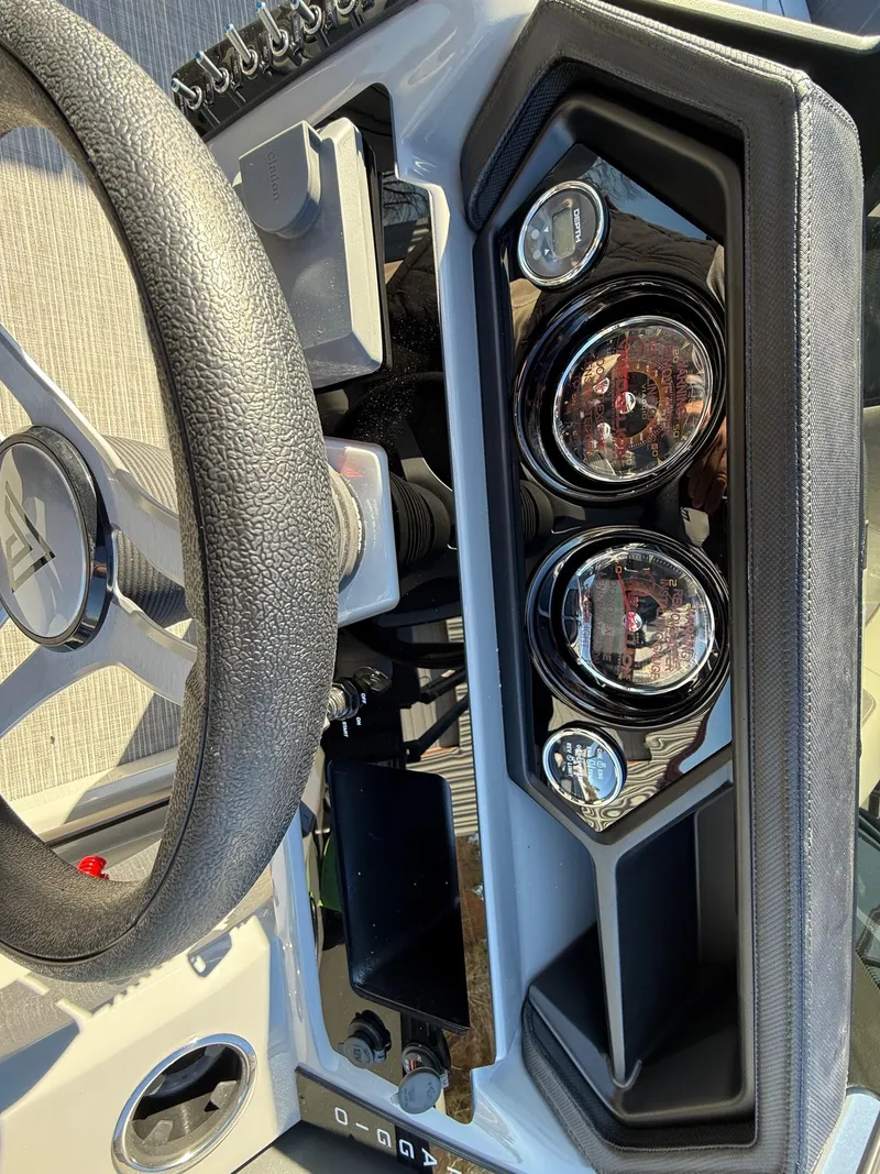 Slide: The Image of Dashboard of a 2025 Viaggio x20u with steering wheel and instrument panel. - 13