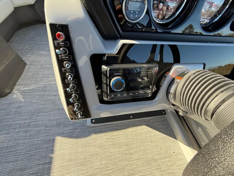 Slide: The Image of Control panel of 2025 Viaggio x20u boat with modern dashboard and audio system. - 14