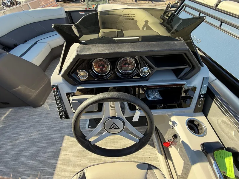 Slide: The Image of 2025 Viaggio x20u boat dashboard with steering wheel and instrument panel. - 17