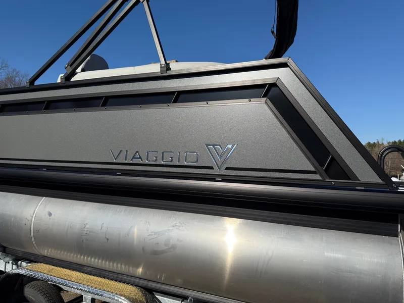 Slide: The Image of 2025 Viaggio x20u boat side view with logo, sleek design, and metallic finish. - 2