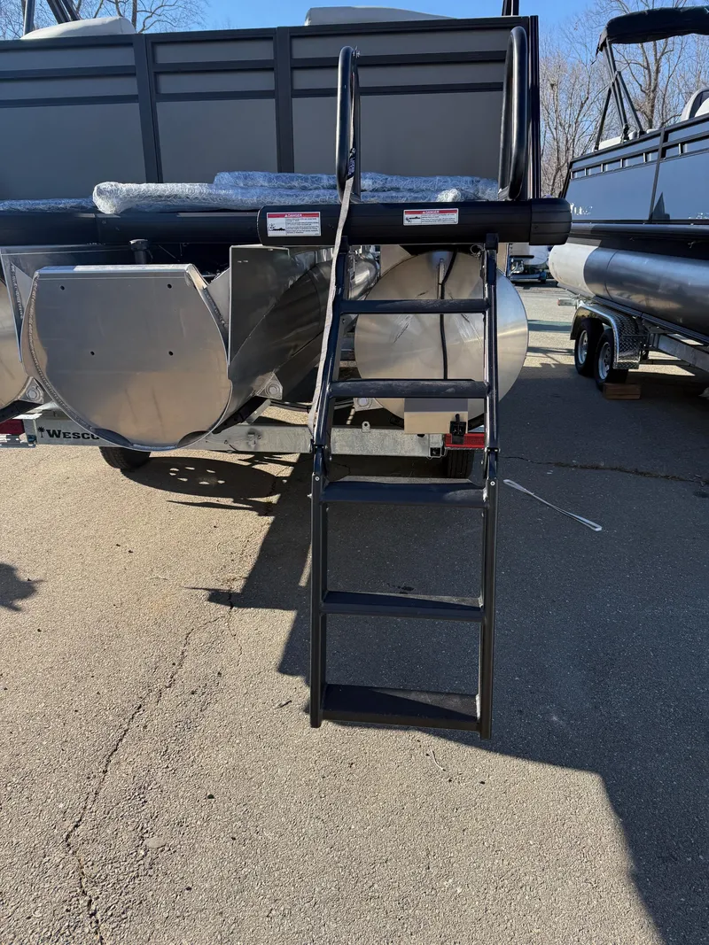 Slide: The Image of 2025 Viaggio x20u boat with rear ladder and pontoon design. - 20