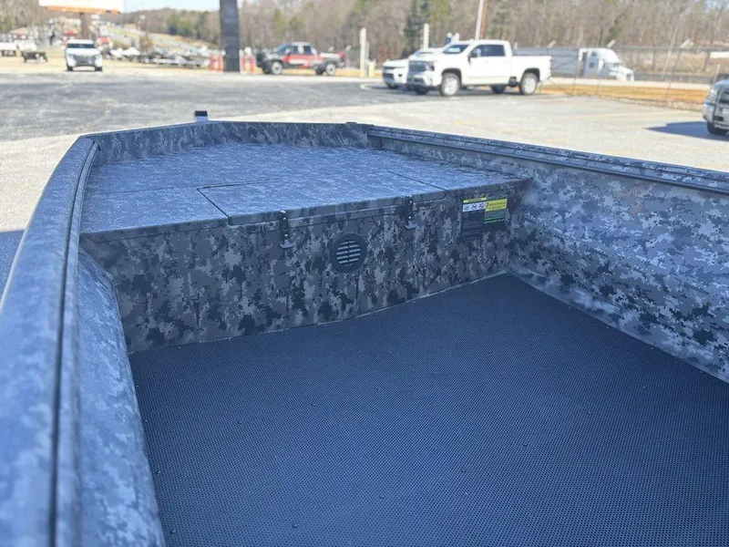 Slide: The Image of Camouflage-patterned Havoc RDBST 1553 boat deck with open storage compartment, 2025 model. - 10