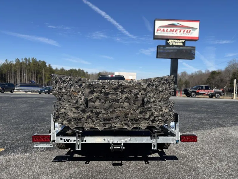 Slide: The Image of 2025 Havoc RDBST 1553 boat on trailer outside Palmetto Boat Center. - 5