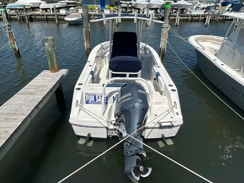 Slide: The Image of 2019 Robalo R202EX boat with Yamaha motor, docked and for sale. - 6