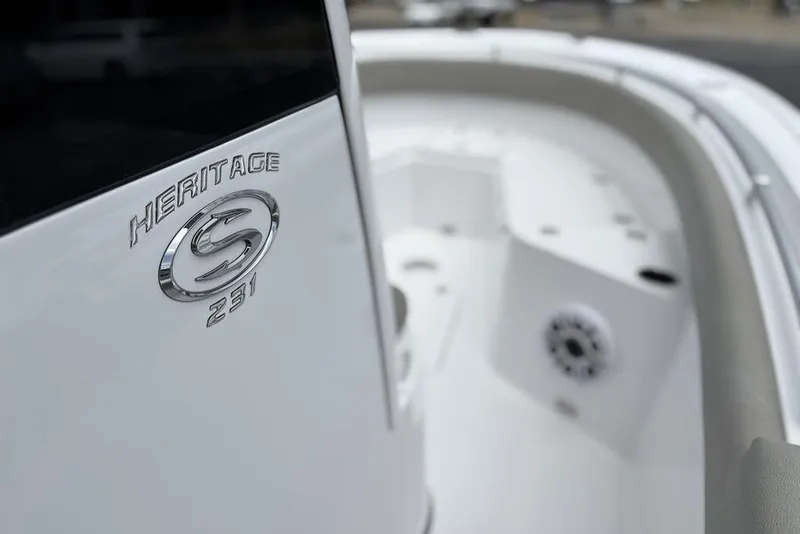 Slide: The Image of 2025 Sportsman Heritage 231 boat interior with logo detail. - 22