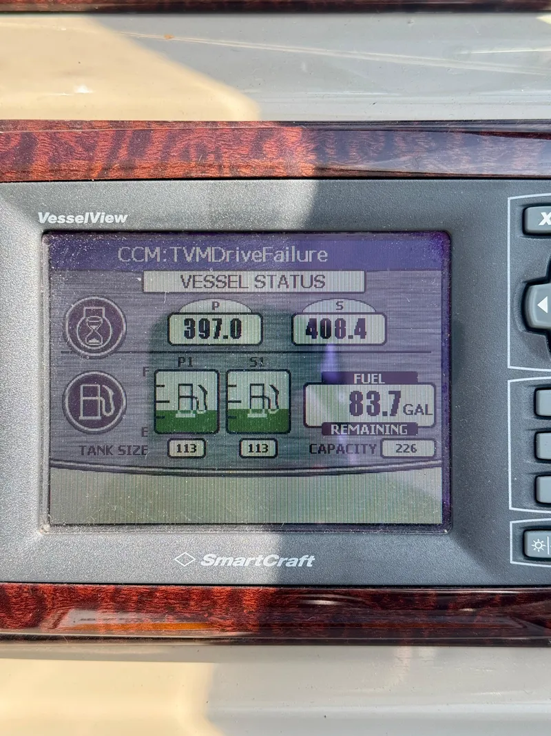 Slide: The Image of SmartCraft display on 2009 Sea Ray 350 Sundancer showing vessel status and fuel levels. - 17